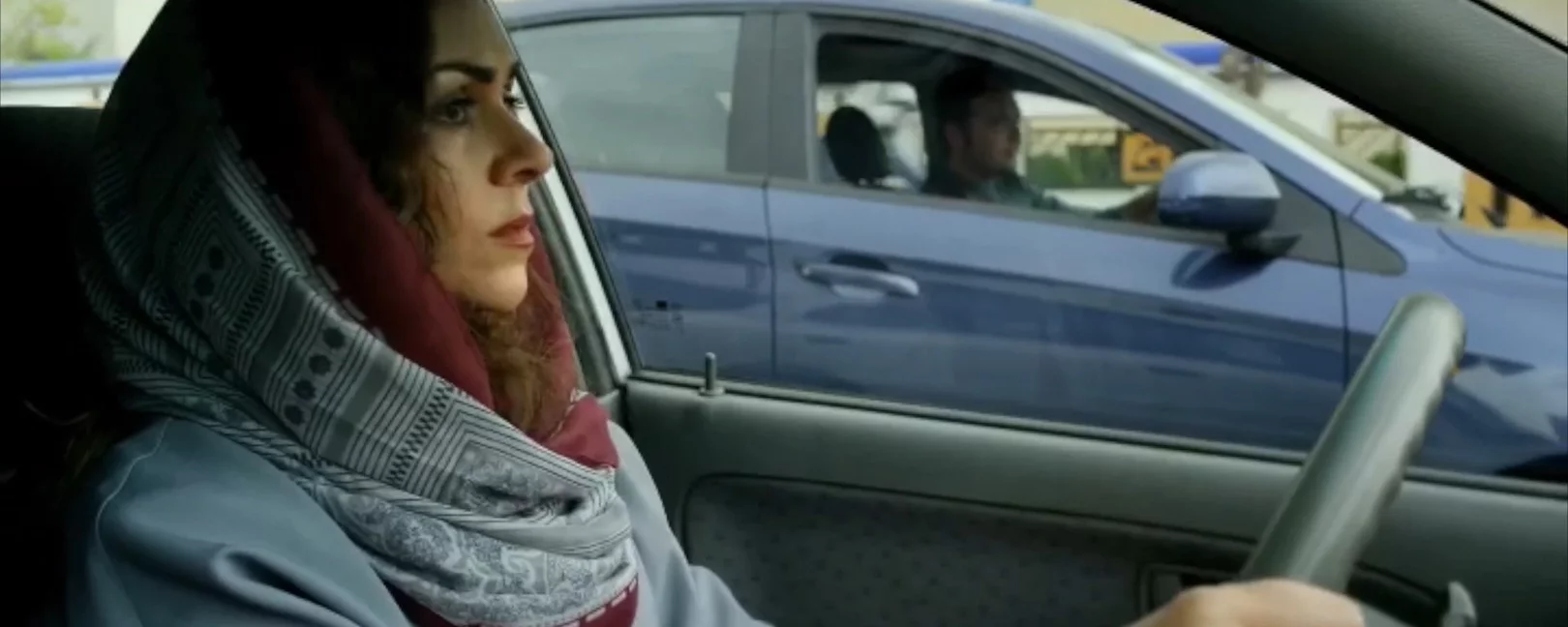 A Women Driving a car