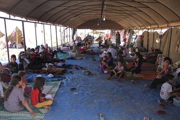 Iraqi Yazidi refugees in Newroz camp receive help from International Rescue Committee Iraqi Yazidi refugees in Newroz camp receive help from International Rescue Committee
