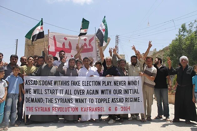 Activists from the  Syrian village of  Kafranbel commenting  on the elections
