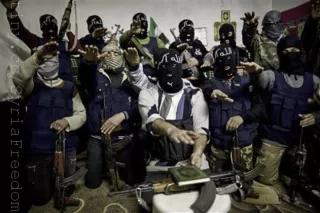 Free Syrian Army fighters swear to the Qur'an, to fight against government troops until the last soldier is alive in Idlib, north Syria Free Syrian Army fighters swear to the Qur'an, to fight against government troops until the last soldier is alive in Idlib, north Syria